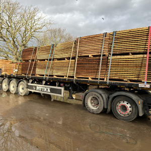 Bulk fence panels and fencing materials prepared for delivery to merchant customers.